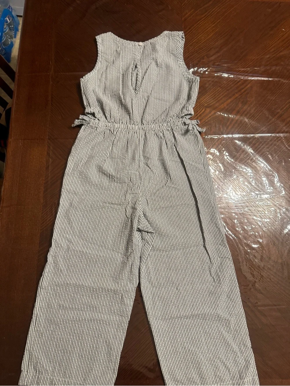 Lot of 2 Carter's Black Floral Smocked Romper and gray striped jumpsuit